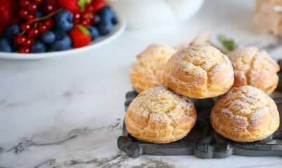 traditional choux pastry eclair dessert on a plate