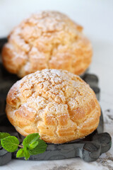 traditional choux pastry eclair dessert on a plate