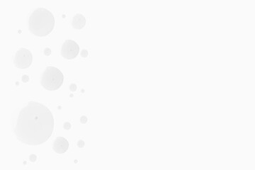 Drops of transparent gel on a light background. Empty space