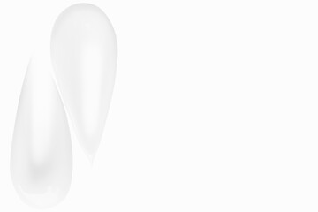 cream smears on a light background. Empty space