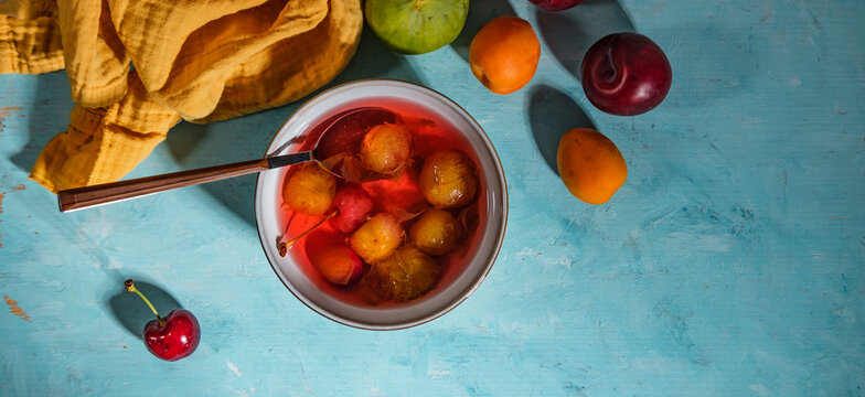 bowl of hosaf a turkish compote dessert of fresh fruits boiled in water with sugar