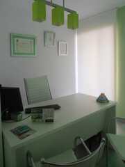Clinic, in white and green colors