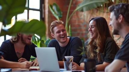 A business team in a casual meeting, laughing and interacting, showcasing a collaborative and friendly work environment