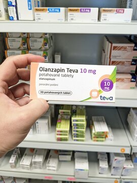 Prague,Czech Republic-July 9 2024: Olanzapin TEVA box of medication with Olanzapine active substance by TEVA,used for treatment of schizophrenia,bipolar disorder,psychosis,mood swings,agitation.