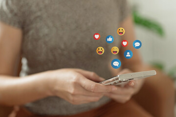 The concept of living on vacation and playing social media. Social media and digital online concept, man using smart phone with Social media. Social Distancing ,Working From Home concept.