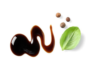 Delicious balsamic vinegar, basil and peppercorns isolated on white, top view