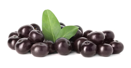 Fresh ripe acai berries and green leaves isolated on white