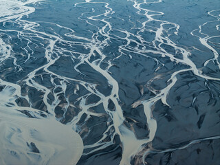 Aerial view of braided river patterns in Iceland.