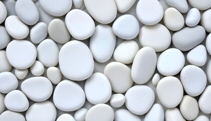 Breathtaking, macro-level image highlighting the subtle, captivating textures adorning the surfaces of a collection of spotless, chalk-white stones or pebbles