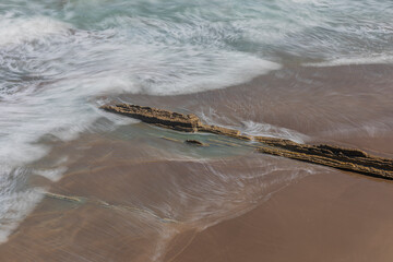 Itzurun beach in the city of Zumaia (Euskadi), in northern Spain, famous for its flysch.
Long exposure photography technique.