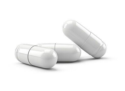 White medical capsules. Cut out on transparent
