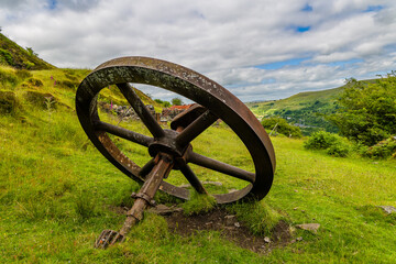 Fototapeta premium Remains of a large flywheel from a lifting engine on the site of a former steelworks (Ebbw Vale, Wales)