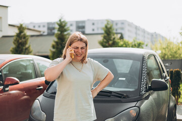 30s unhappy Woman Waiting for help tow truck or technical support. A woman calls the service...
