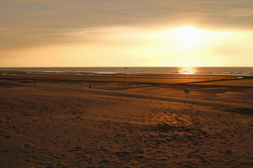 A summer sunset at the Nord Sea beach in Nieuwpoort, Belgium