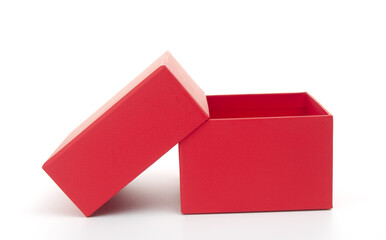 Open red cardboard box with cover  isolated on a white background
