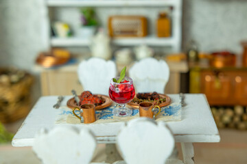 retro-style miniature dollhouse scale kitchen roombox with handcrafted furniture, dishes and utensils, miniature enthusiasts
