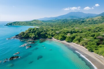 Aerial view of a tropical beach with turquoise waters, green vegetation, and distant mountains