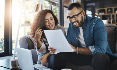 Happy, budget paperwork or couple with laptop, financial documents and planning savings in home. Economy, reading taxes or people organizing bills for finance or paying debt with loan policy or smile