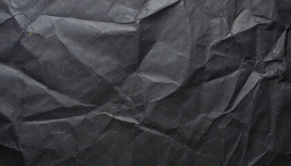crumpled black office craft sheet paper, abstract minimalist luxury texture background wallpaper with space for copy and presentation, waste recycling
