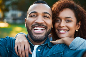 Fototapeta premium Happy couple, hug and selfie in outdoor portrait, social media and relationship update in park. People, garden and romance on weekend trip for marriage, support and photography on travel or embrace