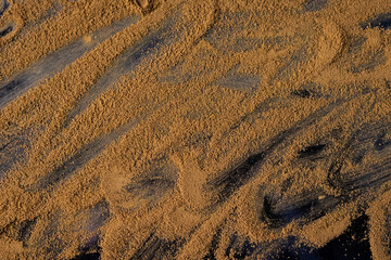 Abstraction. Sugar scattered on dark background