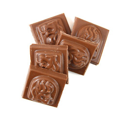 Chocolate pieces on white background
