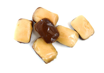 Caramel and coffee candies isolated on white background