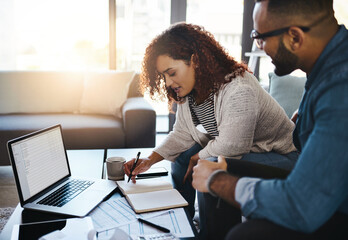 Planning, financial notebook or couple with laptop, finance documents and savings budget in household. Writing, talking or people organizing bills checklist and paying debt online with diary entry