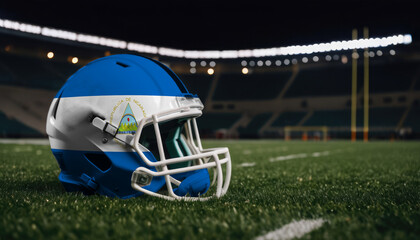 An American football helmet with the Nicaragua flag design sits on a field at night, under stadium lights
