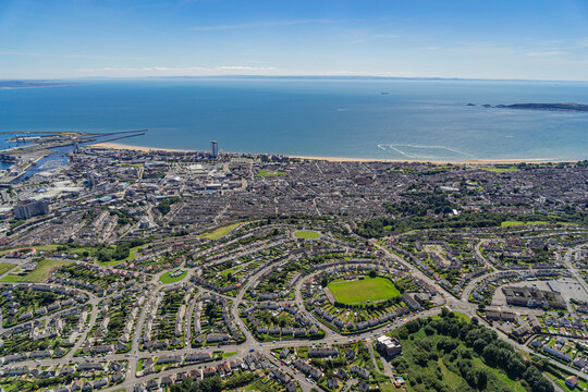 Aerial helicopter views over Swansea, Mumbles and the Gower Peninsular, Wales, UK
