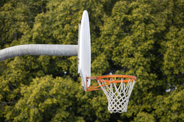 weathered basketball hoop and backboard up close