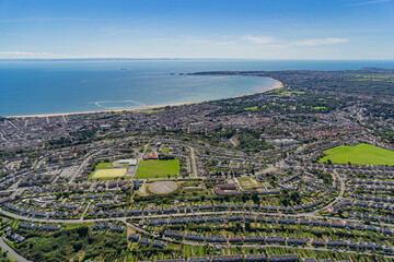 Aerial helicopter views over Swansea, Mumbles and the Gower Peninsular, Wales, UK
