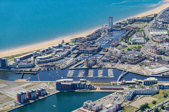 Aerial helicopter views over Swansea, Mumbles and the Gower Peninsular, Wales, UK
