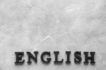 Word ENGLISH on grunge grey background