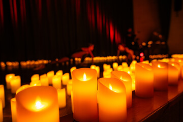 balerina dancing on stage with lots of candles © Ruslan