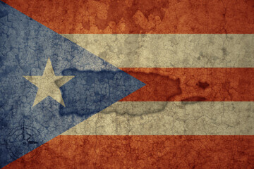 map and flag of puerto rico on a old vintage crack paper background .