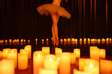 balerina dancing on stage with lots of candles © Ruslan