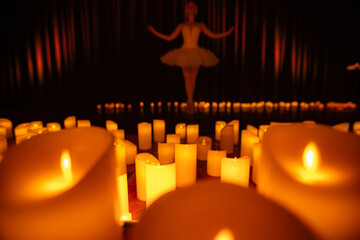 balerina dancing on stage with lots of candles © Ruslan
