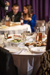 Glasses of champagne on a festive table in a restaurant