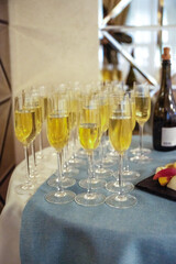 Glasses of champagne on a festive table in a restaurant