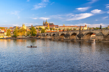 Charles bridge (Karlův most) and Hradcany castle hill over Vltava in golden hour,, Prague, Czech Republic