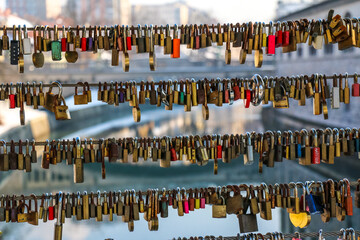 close up padlocks on a bridge