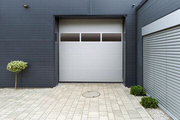 Industrial Garage Door with Small Tree