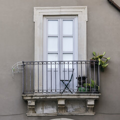 balcony with flowers italy old town 