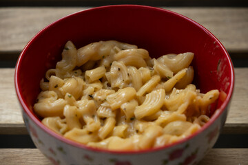 macro shot of macaroni with cheese	