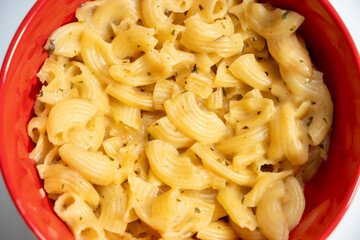 macro shot of macaroni with cheese	