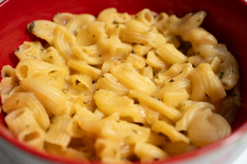 macro shot of macaroni with cheese	