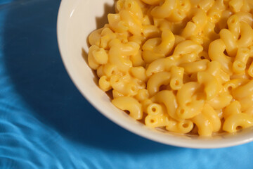 macro shot of macaroni with cheese