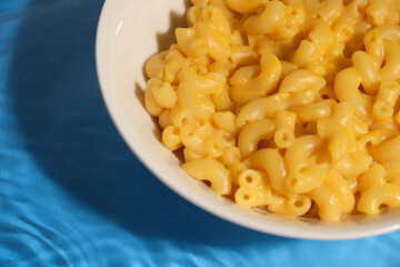 macro shot of macaroni with cheese	