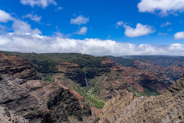 Fototapeta premium Waipo'o Falls, Waimea Canyon State Park, west Kauai, Hawaii. Waimea Canyon, also known as the Grand Canyon of the Pacific. 
